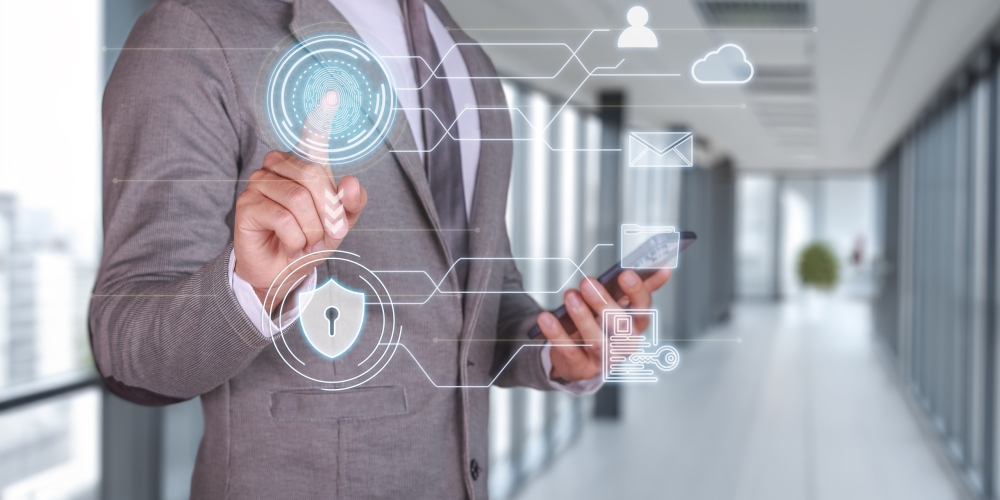 Businessman Using Biometric Security to Access Encrypted Cloud Data Businessman Using Biometric Security to Access Encrypted Cloud Data
